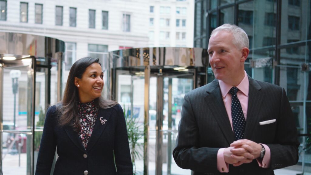 Austin Shapard and Suma Nair walking into 53 State Street